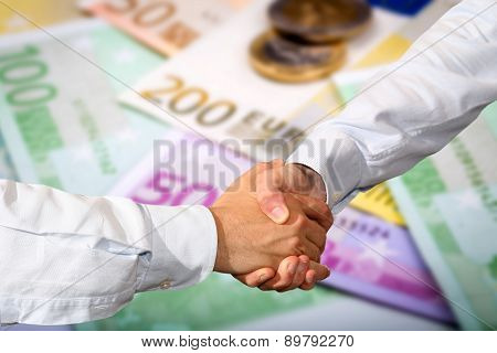 Closeup Of Euro Banknotes And Coins