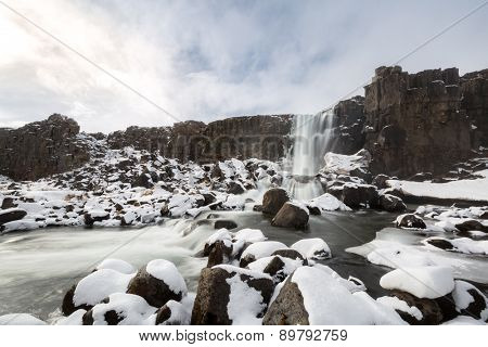 Oxararfoss Waterfall in the winter in pingvellir valley  National Park in Iceland