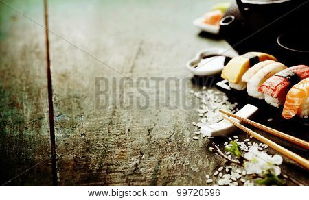 Closeup of fresh sushi  on rustic wooden table