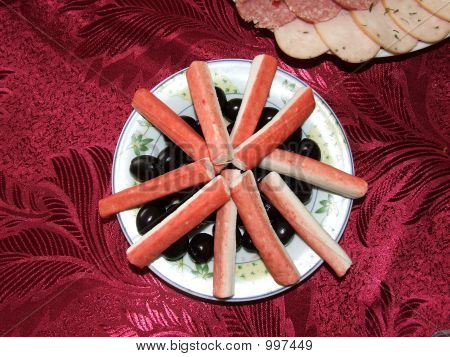 Varas de caranguejo e azeitonas