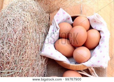 Chicken Brown Eggs On Wood Background
