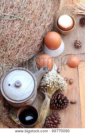 Soft-boiled Egg And Eggs On Wood Background