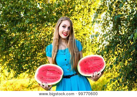 Beautiful Young Woman Holding Two Halfs Of Juicy Watermelon