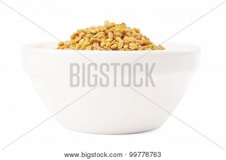 Fenugreek Seeds In White Bowl On White Background