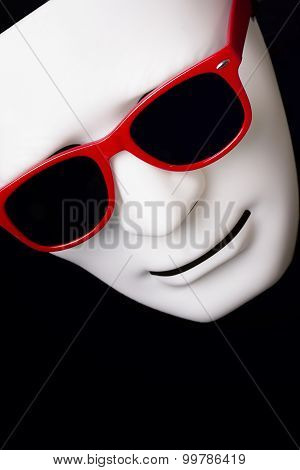 carnival mask in red glasses