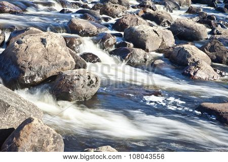 Clear fresh water in the river. Ecological background.
