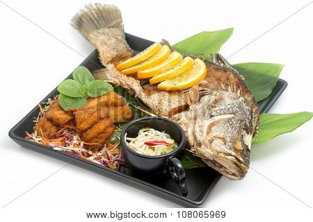 Fired Fish With Fishsauce And Mango Salad , Thai Food  Favorite