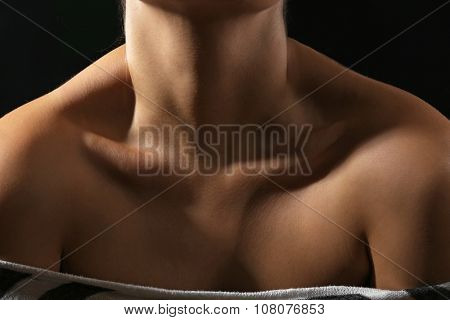 View on woman's neck, collarbone and shoulders, close-up