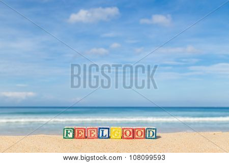 Word Feelgood In Colorful Alphabet Blocks On Tropical Beach