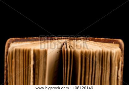 Ancient Book Shot On Black Background