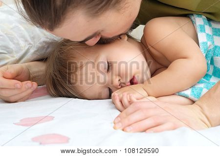 Daddy Kissing Sleeping Baby Daughter