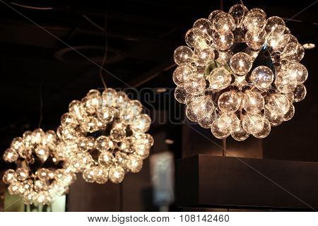Hanging chandeliers made of light bulbs