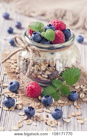 Chia seeds pudding with  blueberries and raspberries