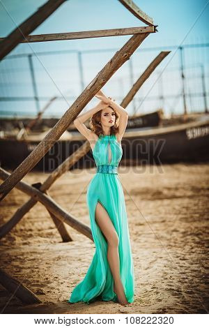 Beautiful young girl on a sea-shore