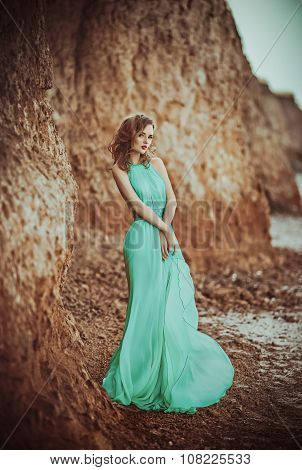 Beautiful young girl on a sea-shore