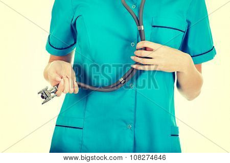 Caucasian woman doctor with stethoscope.