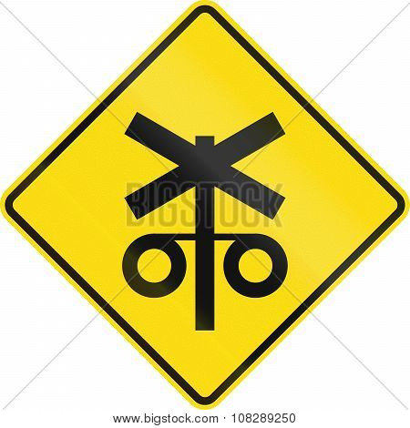 New Zealand Road Sign - Controlled Railway Crossing Ahead With Signals