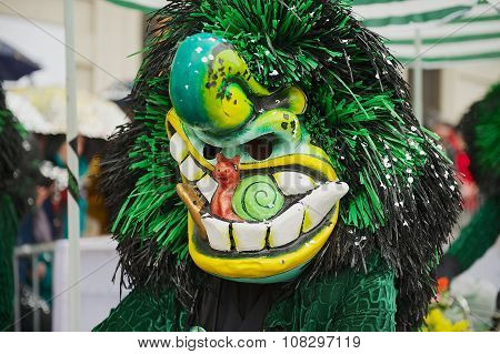 Person wears Waggis mask at Basel Carnival in Basel, Switzerland.