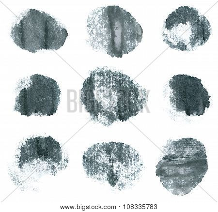 Gray ink round shapes isolated on white background.