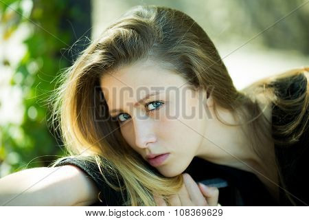 Pretty Blond Girl Posing Outside