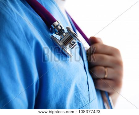 young doctor standing with a stethoscope on a white backgro