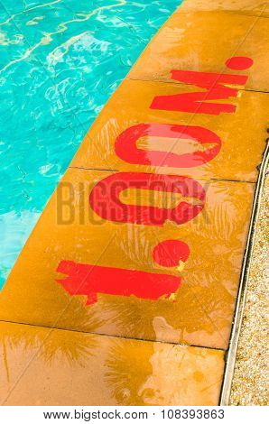 Swimming pool with Number 1.00 on ground at hotel