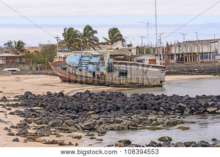 Old Ship Aground On A Beach