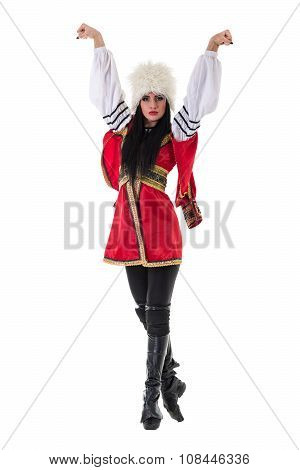 Young woman wearing a folk costumes dancing.  Isolated on white in full length with copyspace