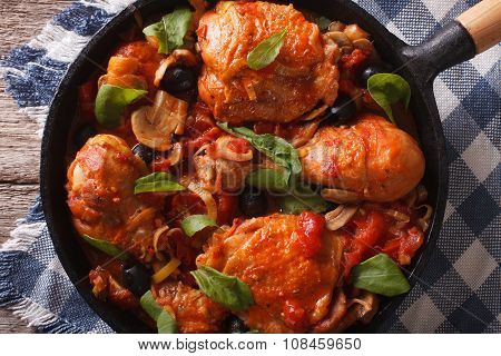 Cacciatori Chicken With Mushrooms Closeup In A Pan. Horizontal Top View