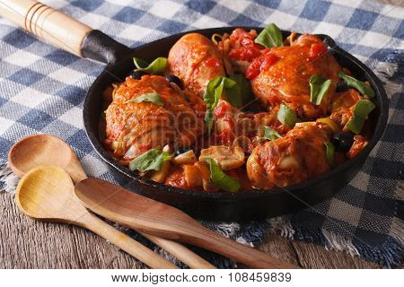 Italian Cuisine: Chicken Cacciatori Close Up In A Pan. Horizontal