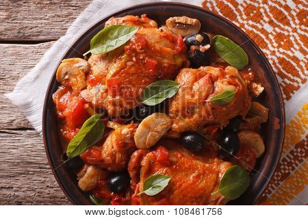 Italian Cacciatori Chicken Closeup On A Plate. Horizontal Top View