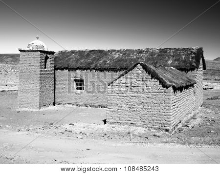 Small rural andean style church made of unfired clay bricks