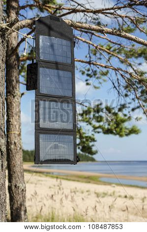 Phone Charges Via Usb Cable From The Portable Foldable Solar Panel