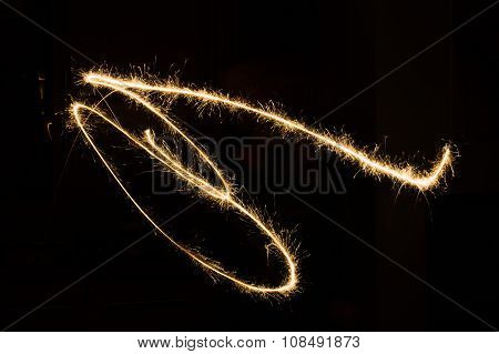 sparkler light trail in dark environment using slow shutter speed