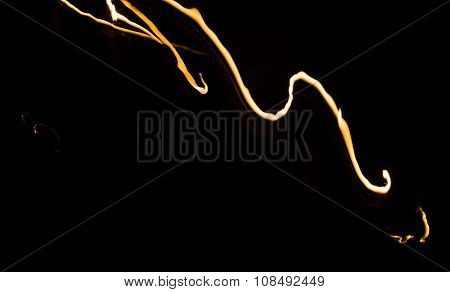 sparkler light trail in a dark environment using slow shutter speed