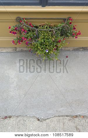 wreath flowers with concrete by the street