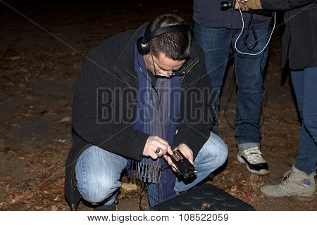 Ron Yacovetti Checks His Audio Device During Paranormal Investigation