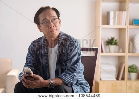 Old man with phone