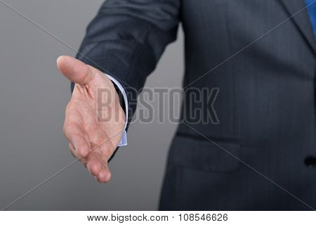 Businessman Offering His Hand For Handshake