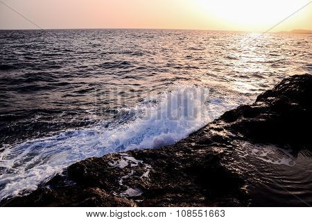 Strong Waves Crashing on the Volcanic Coast