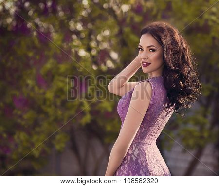 Beautiful young woman with makeup in fashion clothes