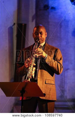 CRACOW POLAND - OCTOBER 29 2015: Branford Marsalis sax playing live music at The Cracow Jazz All Souls Day Festival in Saint Catherine Church. Cracow. Poland
