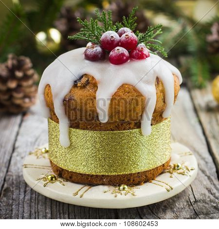 Christmas Fruit Cake Decorated With Icing And Berries
