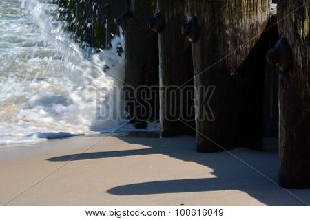 Waves Washing Along Pier