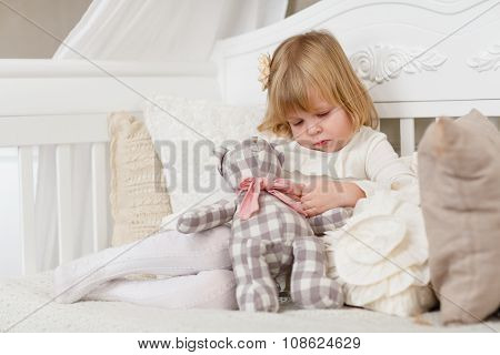 Sad Girl With Toy Bear.