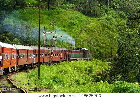 NUWARA ELIYA - SRI LANKA - AUG 3, 2008: riding by train the scenic mountain track from Nuwarelia to Colombo