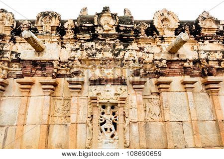 Ancient temple wall depicting Hindu God Nataraja dancing on demon under his legs