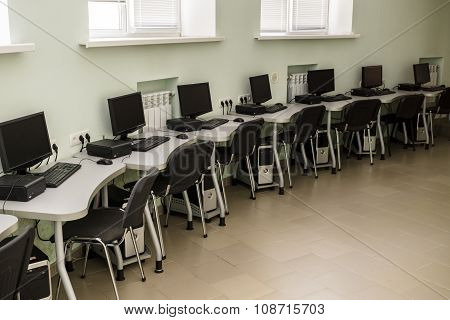 Computer Club, Computer Class With Many Pc, Tables And Chairs