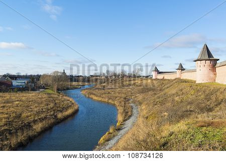 Landscape with  river Kamenka and Wall St. Euthymius monastery in Suzdal, Russia. Golden Ring of Tra