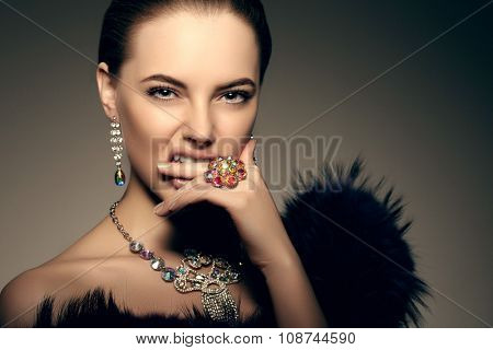 High-fashion Model Beauty Woman precious jewelry Perfect skin lips passion aggression